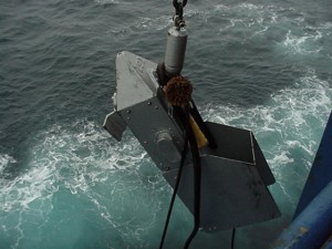 CPR deployment.jpg photo caption: A continuous plankton recorder is lowered into the ocean to be towed behind a cargo ship.
